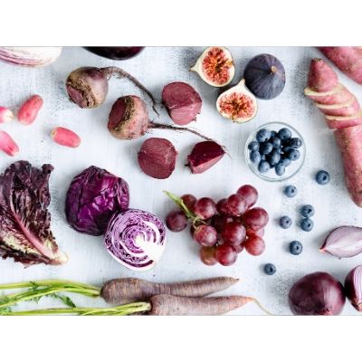 flat lay purple fruit and vegetables