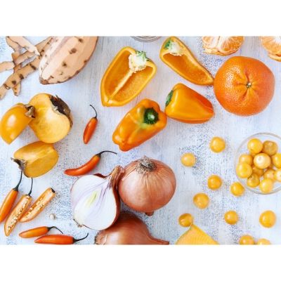 flat lay of orange fruit and vegetables